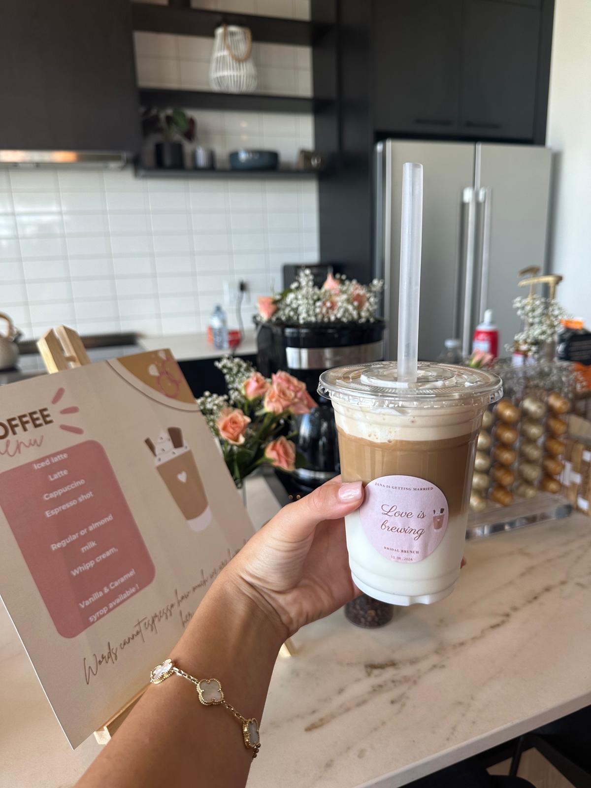 Iced latte with Love is brewing sticker and coffee menu